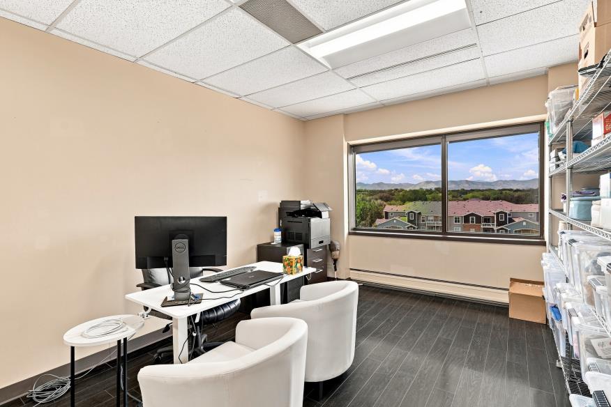 Private furnished office with a western view