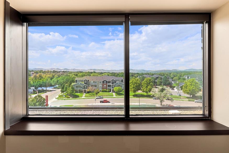 Wide mountain view from a property window