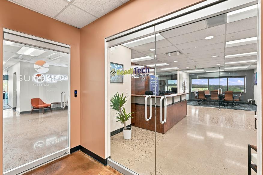 Glass-front private office and corridor