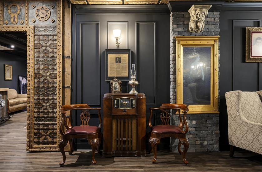 Card table and built-in display in a shared room