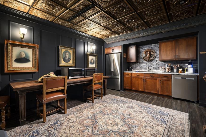 Quiet shared study with desks and built-in cabinetry